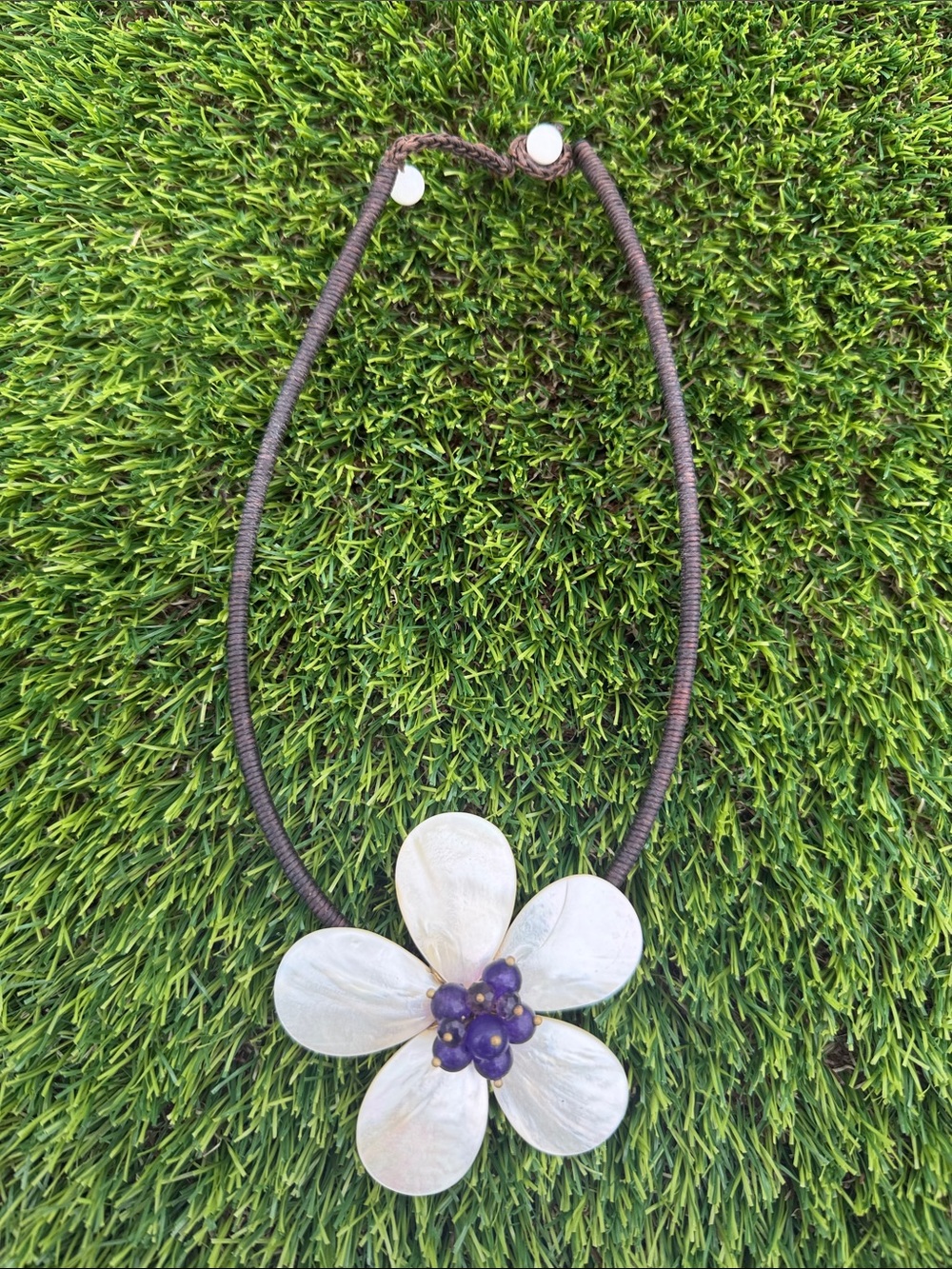 Handcrafted White Shell Flower Necklace with Purple Bead Center
